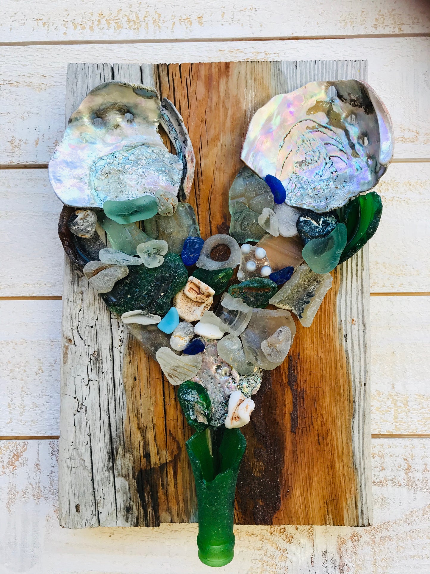 Heart with Abalone Shells on Weathered Wood