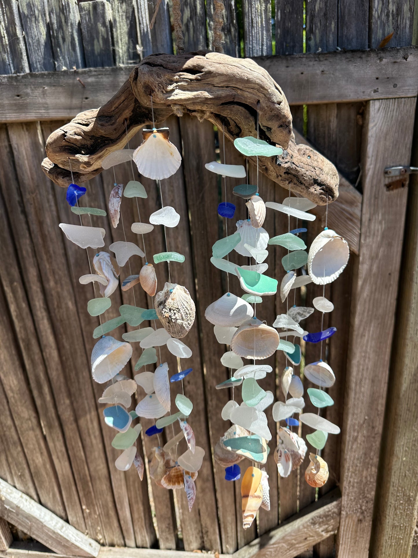 Multi Strand Suncatcher on Curved Driftwood