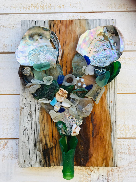 Heart with Abalone Shells on Weathered Wood